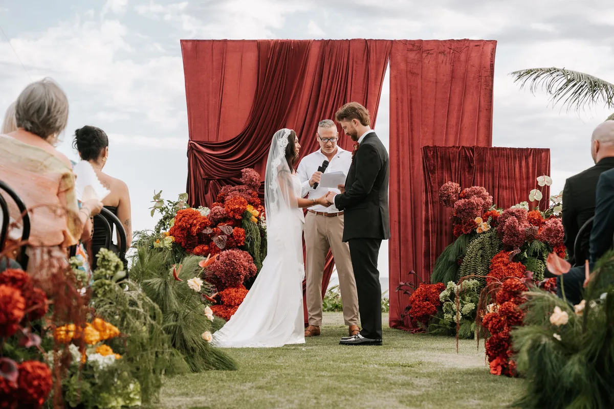 A dramatic red-draped ceremony, the blank canvas at its finest